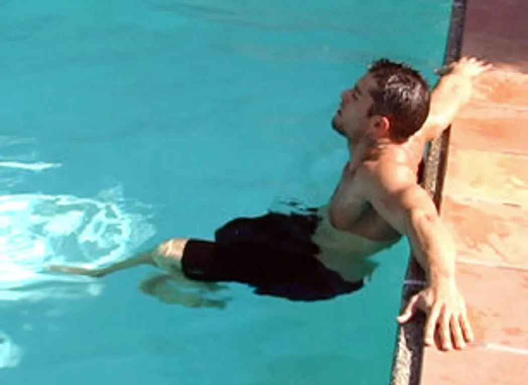 Cody pleasing himself on bed