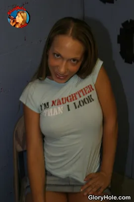 With her parents thinking she's out with friends, Jamie Elle is using her free time to get some big black dick. Her shirt says,"I'm naughtier than I look" and it's extremely true. She's more than naughty, she's downright lewd and crude. Jamie Elle doesn't care what you tag her with as long as she's known as a supreme black cock slut. She's ventured into the glory hole to test the limits of her jaw muscles. First, Jamie pulls down those soaked tiny panties of hers. Next, her beautiful teen titties get some much needed air. The next step into the holy grail of black cock is to suck one anonymously! She does so once one appears much to her delight. Her knees nearly get cut up as she's at the mercy of a wall that's hung better than any white guy she's fucked with. She wants to prolong the experience so she pays ample attention to his fat nut sack before working her way up and down his beefy stick. Jamie's ordeal comes to an end once he unloads a mighty fine dose of ghetto gravy for her to devour.