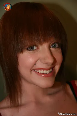 Most girls have an inner freak that shines through at any given time/place.Beau Marie fit into that category from the very minute she traveled to the gloryhole for hardcore interracial sex. The grin on her face indicates that she's no stranger to unusual places but she has no idea what's behind wall # 2. Beau carefully selected the interracial porn that she'd masturbate to and walked her tight ass into the private booth. The blond in the movie was the envy of Beau since she was getting obliterated by a black cock. Each second of the movie got Beau hot and ready as she stripped all her clothes. now in her birthday suit Beau Marie rubbed her pussy until it got raw and creamy. Life soon imitated art when a big black cock entered the gloryhole arena. The black cock poking through the hole in the wall soon found a warm home in Beau's mouth. This red headed maiden got to eye level so she could take in a maximum dose of black meat. We're treated to a shot of her soft pussy as her mouth opens wide for an oral cleaning. The interracial blowjob eventually turns into full blown fucking. Beau Marie faces the opposite wall, spreads open her money maker and backs up on the wall until black cock is hitting the back of her teeth. This new convert to black dick clenches her tits and lips while her uterus gets overrun by a black aqueduct.Tears of joy run down her face and it's not too long before she's on her knees welcoming a flood of black nourishment.