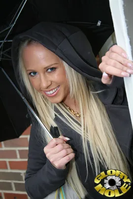 Carla Cox
 Carla is on vacation in LA, and is stunned to find out that it does indeed rain in California, in fact it has every day of her vacation. To find a little excitement, she seeks out a gloryhole, and with the right advice, manages to find ours. She enters, and strips, showing off one fine Hungarian body, which looks even better, as she masturbates and gets herself all worked up. 
 When a huge black dick enters the picture, she is struck by it's size, and in her European accent, says "what is this? Horsecock?" She tears into that huge slab of black tenderloin, and sucks it until she can't resist anymore...she has to have it inside her. She fucks it as best as she can with a wall in the way, then goes back and finishes it in her mouth, enjoying her first ghetto smoothie!