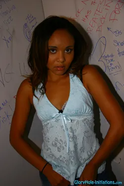 Octavia is a little shy, but admits that she loves girl-on-girl porno.  Her first lesbian experience was when she was in college & she was with 3 other girls.  A lesbo orgy!  She's been with black girls & black guys, but never with a white guy.  Well,  this was her first... she had no problem sucking on a white dick when it showed up in the gloryhole & she got her whole fucking body plastered in the end.  Enjoy!