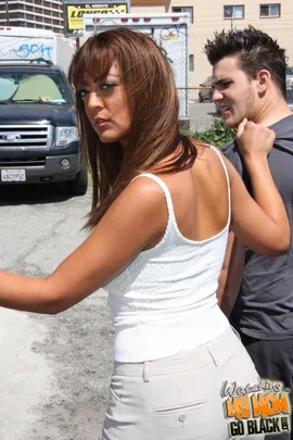 Michaela Mancini is one fine ass Cougar. Just look at those big MILF tits and shaved pussy!  We thought she was out of town so her son and I tried car jacking some white boy in our hood. Little did we know his Mom was nearby and came down hard on us. That crazy white bitch made it seem like I was responsible for her son's bad behavior.  They say white sluts get better with age and I ain't doubting that. This MILF took good care of herself since she was fine as fuck.  She soon cut a deal with me that she'd ride my big black cock if her son wouldn't ride in my sick car. The white slut made her son watch it all which proves that white people are crazy as fuck. I dropped my load on her face and dropped white boy from my cell phone. 