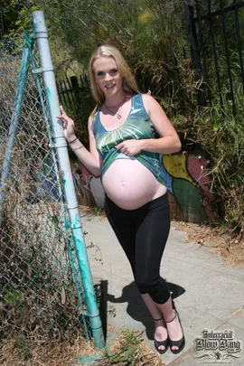 It looks as if there's going to be another generation of whitey to keep the brother down! Hydii May is carrying the seed of someone but her secret desire is to please as many black men as possible. Hydii's ready to drop that baby but not before becoming the newest target of multiple black cocks.  The entire congregation was teased as Hydii rubbed her phat ass against all our cocks before giving some bomb ass head. No brother was denied the oral skills of this white devil as Hydii gave us all dome. Hydii's baby was kicking as she gobbled up all out big, black cocks right before we had to tap that ass. Hydii backed that thing up like a garbage truck and we took turns poking her uterus. We were not to be denied that killer, white pussy and her milk-filled tits kept shaking. Hydii's pussy was taking all our dicks while her mouth kept a brotha's dick nice and warm. The only thing left in our meeting was to blast her belly with our ghetto gunk. One by one, each disrespected black man took a shot on her baby bump as she massaged it into her skin. We knew white girls were  freaks but this bitch might be the craziest. The devil spawn might never know that his momma is a black cock ho.