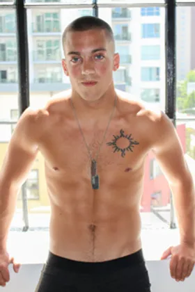 Scotty Dickenson is tugging his thick cock on camera for us